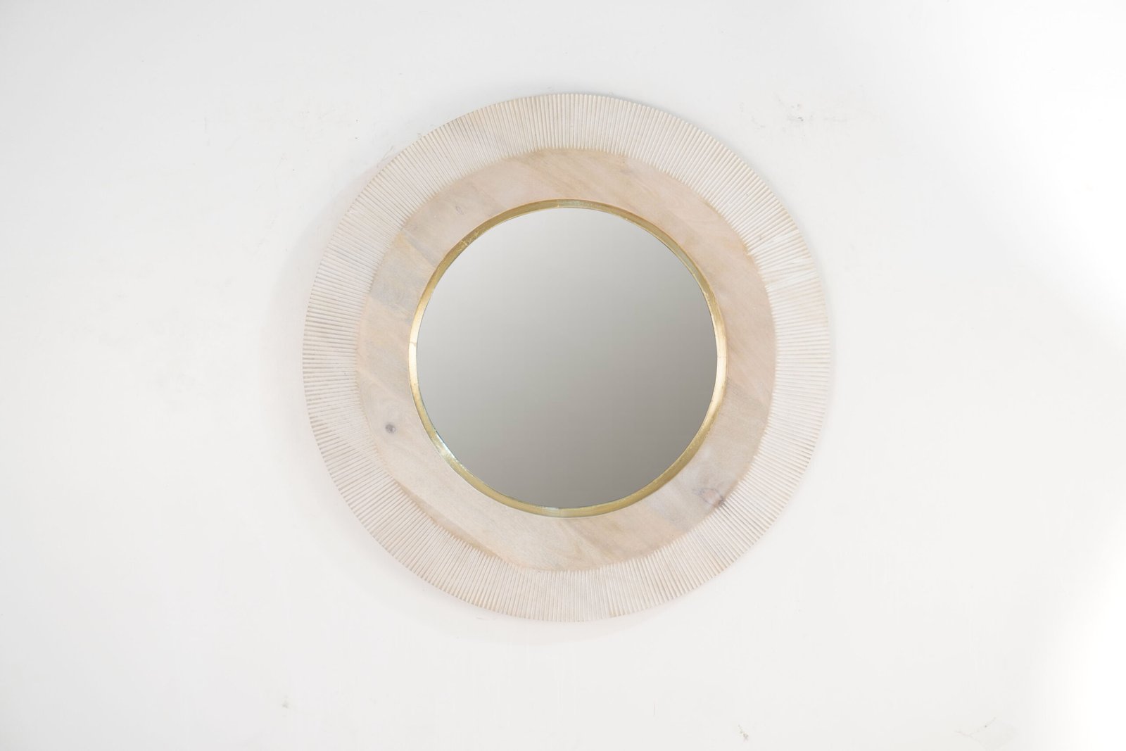 Wooden round carved mirror with plain top layer and brass cladded ring