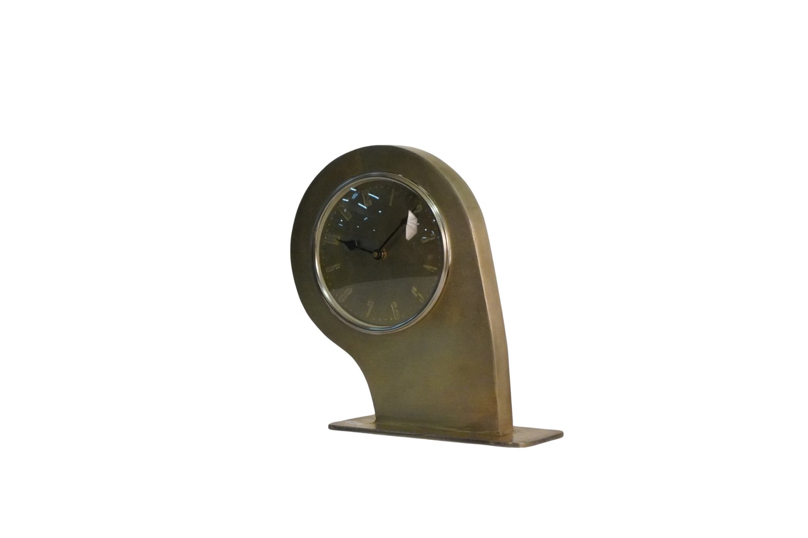 Iron comma design table clock