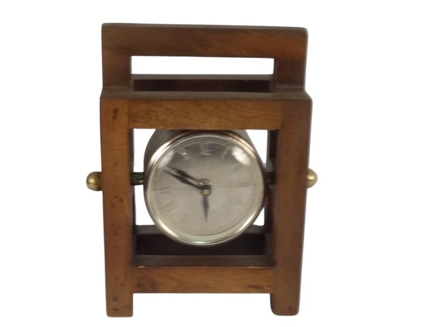 Iron clock in wooden square frame